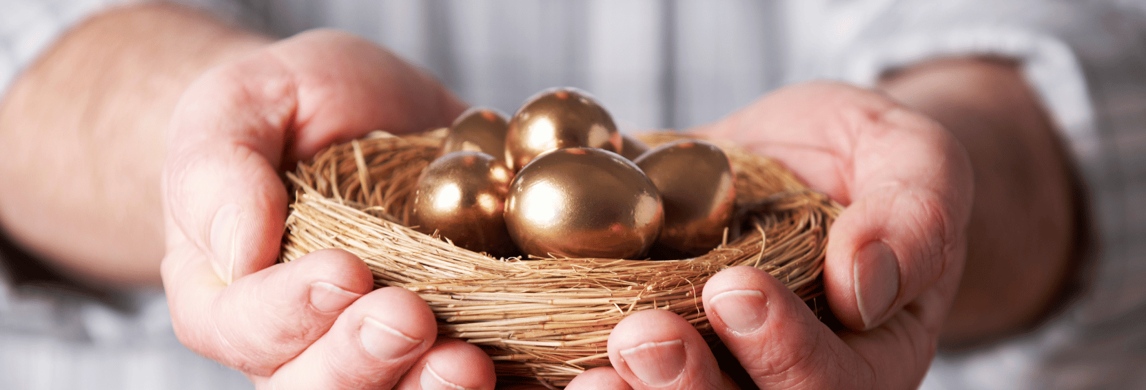Man holding a nest of golden eggs